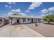 Charming single-story home with desert landscaping and covered parking at 3202 W Glenrosa Ave, Phoenix, AZ 85017