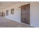 Inviting front porch with security door, white brick, and visible address numbers at 3202 W Glenrosa Ave, Phoenix, AZ 85017