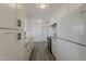 Bright kitchen with white cabinets, updated appliances, and wood-look flooring at 3202 W Glenrosa Ave, Phoenix, AZ 85017
