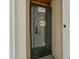 Secure room is a vault style storage room with steel door and combination lock and key at 3202 W Glenrosa Ave, Phoenix, AZ 85017