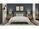 A stunning bedroom with a plush bed, symmetrical nightstands, and baseball themed decor at 32452 N Cherry St, San Tan Valley, AZ 85143