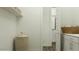 Clean and organized laundry room with white cabinetry and ample storage space at 32452 N Cherry St, San Tan Valley, AZ 85143