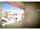 Balcony view features the building and surrounding landscaping at 3434 E Baseline Rd # 216, Phoenix, AZ 85042