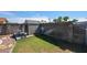 Well-maintained backyard with shed and a lush green lawn at 3608 W Villa Rita Dr, Glendale, AZ 85308