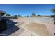 Spacious backyard with gravel landscaping, providing a low-maintenance outdoor area and block wall for privacy at 3608 W Villa Rita Dr, Glendale, AZ 85308