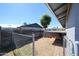 View of the backyard enclosed with a chain link fence for added privacy at 3608 W Villa Rita Dr, Glendale, AZ 85308