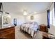 Bedroom with carpet, ceiling fan, and natural light at 3608 W Villa Rita Dr, Glendale, AZ 85308