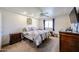 Bedroom with carpet, ceiling fan, and natural light at 3608 W Villa Rita Dr, Glendale, AZ 85308