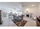 Open dining and kitchen area, creating a connected living space perfect for modern living at 3608 W Villa Rita Dr, Glendale, AZ 85308
