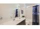 Bathroom with contemporary vanity, a well-lit mirror, and a shower-tub combination at 3858 E Kenley Ln, San Tan Valley, AZ 85143
