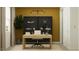 Chic office space offering ample natural light, modern desk setup, and sleek shelving for a productive work-from-home setting at 4571 E French Rd, San Tan Valley, AZ 85143