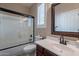 Neat bathroom featuring a modern sink, bathtub, and a window allowing natural light at 5077 E Lonesome Trl, Cave Creek, AZ 85331