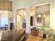 The open-concept living room features wood floors, neutral paint, and is filled with natural light at 5077 E Lonesome Trl, Cave Creek, AZ 85331