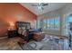 Spacious main bedroom featuring vaulted ceilings, shuttered windows, and stylish decor at 5077 E Lonesome Trl, Cave Creek, AZ 85331