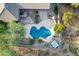 Aerial view of a private backyard with pool, spa, and outdoor kitchen at 5077 E Lonesome Trl, Cave Creek, AZ 85331