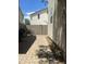 Backyard area with brick pavers, surrounded by a block wall, ready for personalization at 6614 W Polk St, Phoenix, AZ 85043