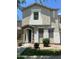 Charming two-story home featuring a stone-accented entrance, modern windows and low maintenance landscaping at 6614 W Polk St, Phoenix, AZ 85043