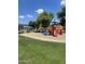 Well-maintained playground with shade trees and a picnic area for families to enjoy at 6614 W Polk St, Phoenix, AZ 85043