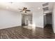 Spacious living room featuring hard surface floors and recessed lighting at 6632 W Saguaro Park Ln, Glendale, AZ 85310