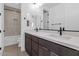 Bathroom with a dual sink vanity, a shower with niche, and modern finishes at 6722 N 9Th Dr, Phoenix, AZ 85013
