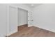 Clean, minimal bedroom with hardwood floors and neutral paint, a perfect blank canvas to imagine at 6722 N 9Th Dr, Phoenix, AZ 85013