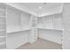 Walk-in closet featuring adjustable shelves and hanging rods for optimal storage at 6722 N 9Th Dr, Phoenix, AZ 85013