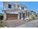 Beautiful home featuring neutral color palette, desert landscaping, brick driveway, and attached garage at 6722 N 9Th Dr, Phoenix, AZ 85013