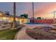 Spacious backyard with a pool and seating area, perfect for entertaining guests and enjoying the outdoors at 6932 E Latham St, Scottsdale, AZ 85257