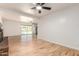 Spacious living room with hardwood floors and a fireplace, ideal for entertaining at 6932 E Latham St, Scottsdale, AZ 85257