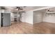 Open-concept living area flows into the kitchen, with hardwood floors and abundant light at 6932 E Latham St, Scottsdale, AZ 85257