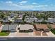 Aerial view of a residential neighborhood showcasing well-maintained homes and green spaces at 8943 W Sierra Vista Dr, Glendale, AZ 85305
