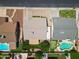 Aerial view of the property showcasing the layout of the house, yard, and surrounding neighborhood at 8943 W Sierra Vista Dr, Glendale, AZ 85305