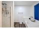 Bathroom features shower stall, soaking tub, and blue blinds over a window at 8943 W Sierra Vista Dr, Glendale, AZ 85305