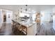 Spacious kitchen with granite countertops, stainless steel appliances, and a large island at 8943 W Sierra Vista Dr, Glendale, AZ 85305