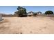 A spacious fenced backyard has ample space for a custom design and a low-maintenance landscape at 9243 W Palmer Dr, Peoria, AZ 85345