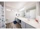Modern bathroom with double sinks, updated fixtures, and coordinated decor throughout at 9243 W Palmer Dr, Peoria, AZ 85345