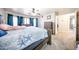 Spacious bedroom with ceiling fan, natural light, and a comfortable bed with attractive linens at 9243 W Palmer Dr, Peoria, AZ 85345