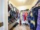 Spacious walk-in closet with ample storage space and organization racks for clothes, shoes, and accessories at 9243 W Palmer Dr, Peoria, AZ 85345