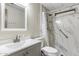 Bright bathroom featuring a vanity with a marble counter and a white marble-lined shower at 9501 E Broadway Rd # Ofc, Mesa, AZ 85208