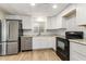 Modern kitchen with stainless steel appliances, granite countertops, and ample cabinet space at 9501 E Broadway Rd # Ofc, Mesa, AZ 85208