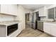 Beautiful kitchen featuring stainless steel appliances, granite countertops, and tiled backsplash at 9501 E Broadway Rd # Ofc, Mesa, AZ 85208