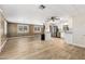 Bright, open-concept living space flows seamlessly into the kitchen with updated appliances and finishes at 9501 E Broadway Rd # Ofc, Mesa, AZ 85208