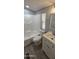 Bathroom with updated fixtures, flooring, a tub and shower combo, and a bright window at 9632 E Arbor Cir, Mesa, AZ 85208