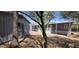 A community of gray homes with covered carports and light-colored entry stairs, and desert landscaping at 9632 E Arbor Cir, Mesa, AZ 85208