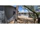 Shot of the manufactured home, including the white porch and ramp leading to the home's entrance at 9632 E Arbor Cir, Mesa, AZ 85208
