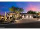 Charming single-story home with beautiful desert landscaping enhancing the curb appeal and design at 9675 E Roadrunner Dr, Scottsdale, AZ 85262