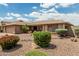 Charming home featuring a large driveway, desert landscaping, and a one-story layout at 10940 E Olla Ave, Mesa, AZ 85212