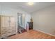 Spacious bedroom with wood floors and ample natural light at 1128 E Phelps St, Gilbert, AZ 85295