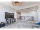 Bonus room with TV and open access to upstairs walkway at 1128 E Phelps St, Gilbert, AZ 85295