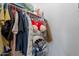 Walk-in closet with custom shelving and plenty of storage space at 1128 E Phelps St, Gilbert, AZ 85295
